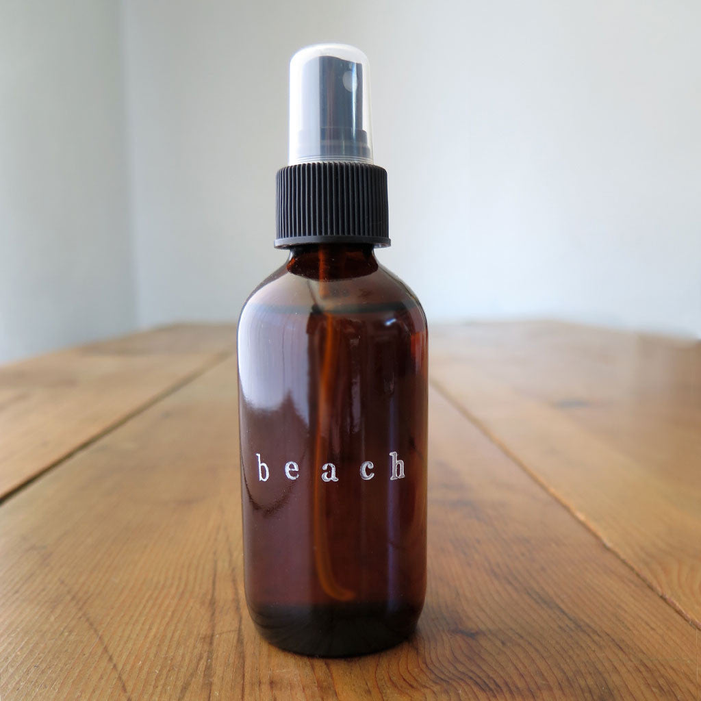 Amber glass bottle of Beach Oil :: Santo Cabo